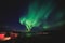 Beautiful picture of massive multicolored green vibrant Aurora Borealis, Aurora Polaris, also know as Northern Lights in Norway