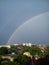 beautiful picturesque rainbow over the city