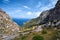 Beautiful picturesque winding road of Spain summer coast and Mediterranean sea with tunnel