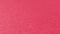 Beautiful pink or fuchsia bright background. Scarlet, purple, uneven color. A sheet of colored paper with a soft fleecy texture