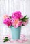 Beautiful pink peony bouquet in vase