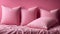 Beautiful pink pillows on a pink background, warm, pastel colors