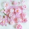 Beautiful pink, rose peonies decorated on white wood table