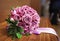 Beautiful pink rose wedding flowers for bride.