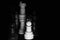 Beautiful plastic chess pieces with black background photo