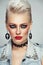 Beautiful platinum blond woman with 80s style makeup