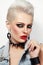 Beautiful platinum blond woman with 80s style makeup