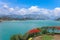 Beautiful point view of Ratchaprapa Dam or Cheow Lan Dam, crystal clear blue freshwater lake with mountains and cloudy sky as