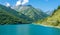 The beautiful Pontechianale Lake on a summer morning. Province of Cuneo, Piedmont, Italy.