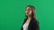 Beautiful portrait of business woman looking to camera green screen background