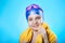 Beautiful portrait of a girl sportswoman swimmer in swimming cap and diving goggles.
