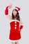 Beautiful portrait young asian woman in Santa cheerful taking a photo in Christmas holiday isolated on white background.