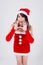 Beautiful portrait young asian woman Santa costume shout sound loud for announce with excited and happy in holiday xmas