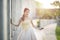 Beautiful portraits with natural light asian woman bride in wedding dress