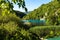 Beautiful postcard with view lakes Plitvice National Park of Croatia. Green turquoise natural background.