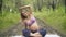 Beautiful pregnant woman doing prenatal yoga on nature outdoors. Sport, fitness, healthy lifestyle while pregnant