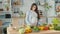 Beautiful Pregnant Woman Happily Preparing a Vegetable Salad The Concept Of Diet