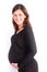 Beautiful pregnant woman holds hands on belly Young mother waiting of a baby. Concept of pregnancy, maternity, health care,