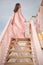 Beautiful pregnant woman on the lifeguard tower