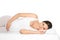 Beautiful pregnant woman lying with orthopedic pillow on bed