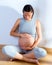 Beautiful pregnant woman massage hands on belly