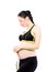 Beautiful pregnant woman measures the abdominal circumference centimeter tape