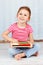 Beautiful preschool child holding abacus and smiling