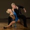 Beautiful professional latin dance couple preform exhibition da