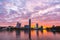 Beautiful purple and orange cloudy sunset at the city pond of Yekaterinburg, Russia