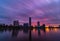 Beautiful purple and orange cloudy sunset at the city pond of Yekaterinburg, Russia