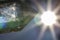 Beautiful Quartz Crystal Close Up with the bright sun in the background