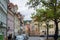 Beautiful and quiet square in Prague, Czech Republic, with trees and colorful houses