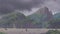 Beautiful rainy natural scenery background animation with Japanese anime illustration style. seamless looping video animated video