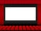 Beautiful red cinema hall with seats facing a white screen between red folded curtain drapes on a black stage vector