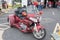 A beautiful red custom tricycle on display at the 2018 Sturgis Motorcycle Rally.