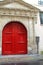 Beautiful red doors at entrance to Hotel Jean Bart, Paris,France,2016