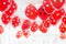 Beautiful red dotted balloons floating at white ceiling. Wedding or children birthday party decoration interior