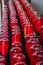 Beautiful red glass prayer candles lined up in rows