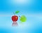 Beautiful red and green two apples with Glossy Blue Surface background illustrations