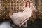 Beautiful Red Head Pinup Fashion Model on Styled Set