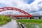 Beautiful Red Iron Bridge Kecheng Bridge And Morning Train Across The Rice Plantation At Yuli