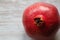 beautiful red pomegranates, pomegranates on a tray, pomegranate seeds, a colored napkin, pomegranate seeds