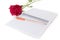 Beautiful red rose , pencil and notebook white background.