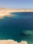 Beautiful Red Sea with azure water, yachts and ships and desert