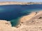 Beautiful Red Sea with azure water, yachts and ships and desert