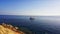Beautiful Red Sea beach with umbrella and ships, Sharm el Sheikh, Egypt