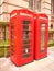 Beautiful red telephone box in the middle of the city center