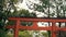 Beautiful red tori gate at Maruyama of Kyoto. Park with japanese torii gateways