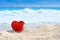 Beautiful red Valentines day heart on a tropical white sand beach