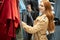 Beautiful redhaired woman in search of clothes